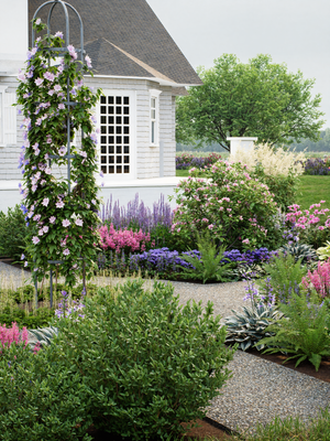 Shade garden with a formal planting of flowers and a white building in the background
